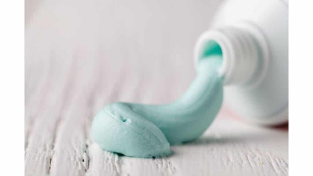 Toothpaste squeezed out from a toothpaste tube